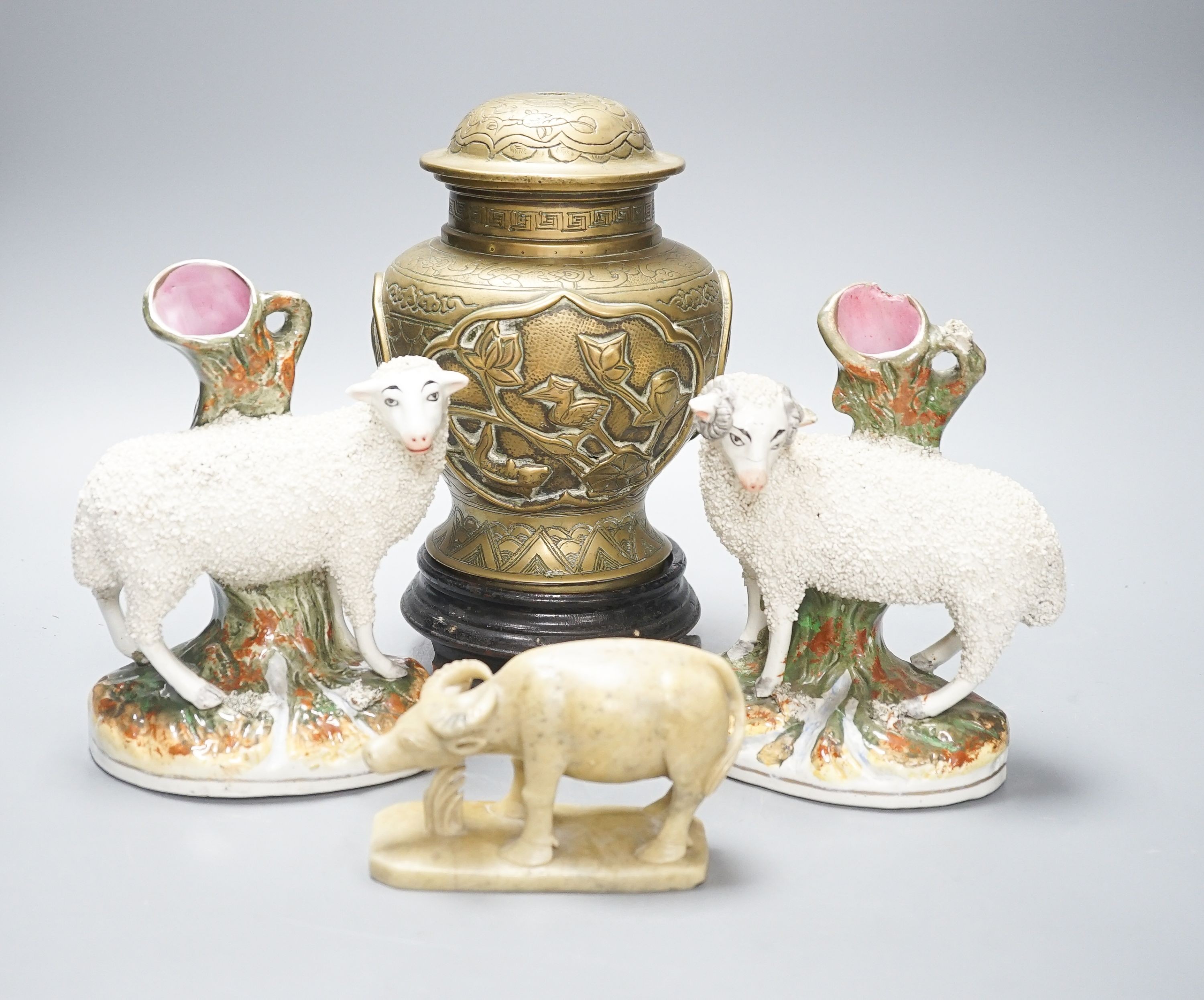 A Chinese bronze vase on stand, a soapstone figure of an ox and pair of Staffordshire sheep spill vases, 19cm